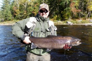 Jody Harrison with last big salmon he caught -  the LSW Miramichi – Rocky Island Pool just below Clelands